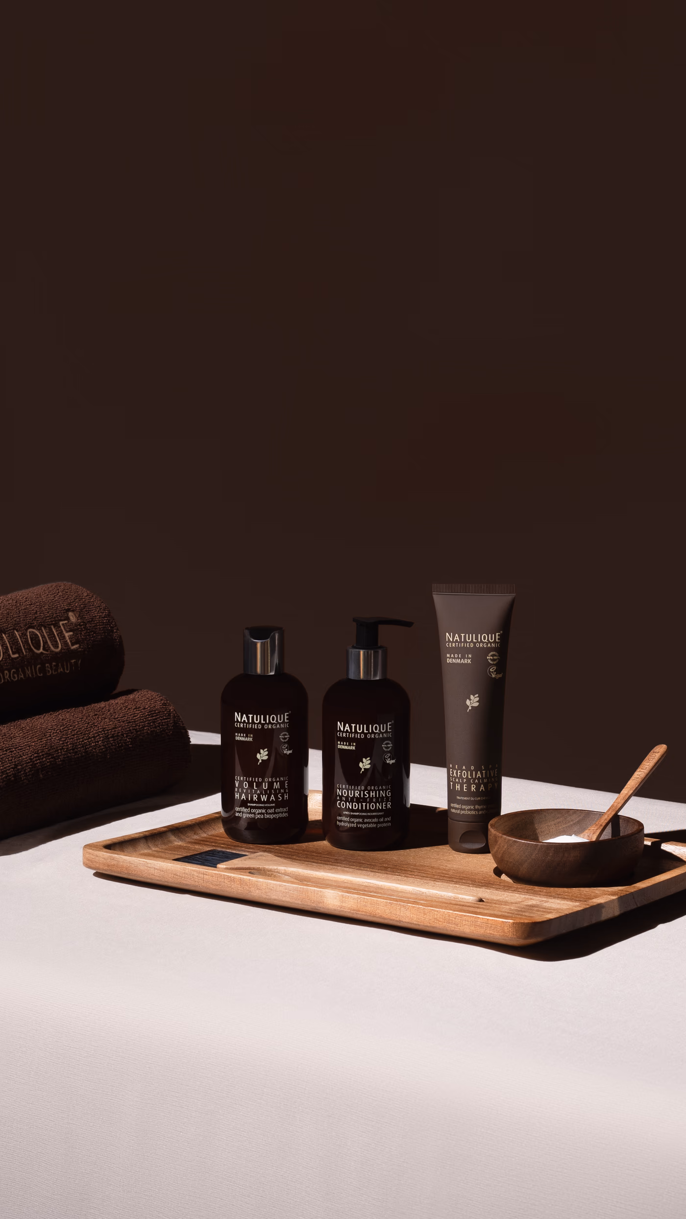 Natulique certified organic volume hair wash, nourishing conditioner and exfoliative therapy products